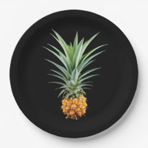 Pineapple with big hairdo on black background