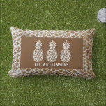 Pineapples Personalized Outdoor Lumbar Pillow<br><div class="desc">Three pineapples accent this outdoor lumbar pillow,  great for your home or a gift for a new homeowner personalized with your family name on a woven wood print pattern. (Not actual wood,  it is an illustration printed in full color.)</div>