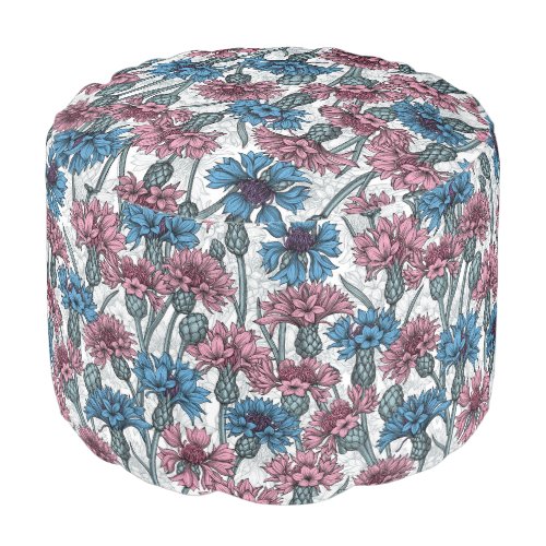 Pink and blue cornflowers wild flowers on white pouf