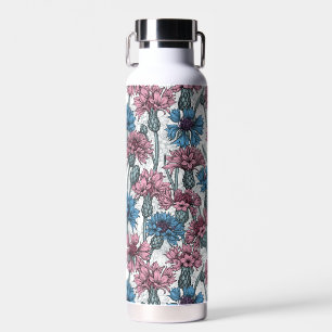 Pink and blue cornflowers, wild flowers on white water bottle