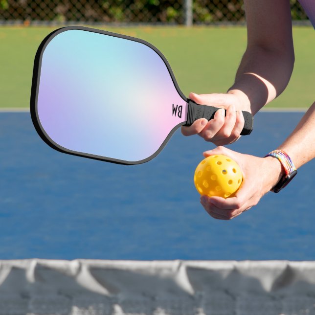 Pink and blue ombre background pickleball paddle (Insitu)