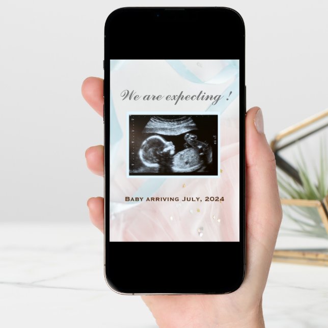 Pink and blue ribbons with baby ultrasound announcement (Front Digital)