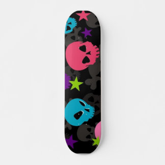 pink and blue skull skateboard deck