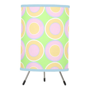 Pink And Butterscotch Donuts With Filling On Green Tripod Lamp