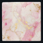Pink and gold Marble effect Stone Coaster<br><div class="desc">Protect your surfaces in luxurious style with this elegantly designed pink and gold marble effect stone coaster. The intricate veining and gold effect splashes create an elegant and sophisticated decorative design that is perfect for any modern home. These modern coasters are not only practical but also make a great decorative...</div>