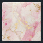 Pink and gold Marble effect Stone Coaster<br><div class="desc">Protect your surfaces in luxurious style with this elegantly designed pink and gold marble effect stone coaster. The intricate veining and gold effect splashes create an elegant and sophisticated decorative design that is perfect for any modern home. These modern coasters are not only practical but also make a great decorative...</div>