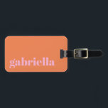 Pink and Orange Bold Typography Personalized Name  Luggage Tag<br><div class="desc">Travel in style with this personalized luggage tag featuring a modern minimalist design. The pink elegant serif name stands out against a soft orange background, creating a chic and timeless look. Perfect for frequent travelers, business professionals, students, and vacationers who want to easily identify their bags. The back includes space...</div>