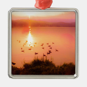 Pink and peach lake sunset metal ornament