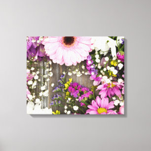 Pink and Purple Flowers on Wood Canvas Print
