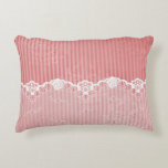 Pink and white background with black lace accent pillow