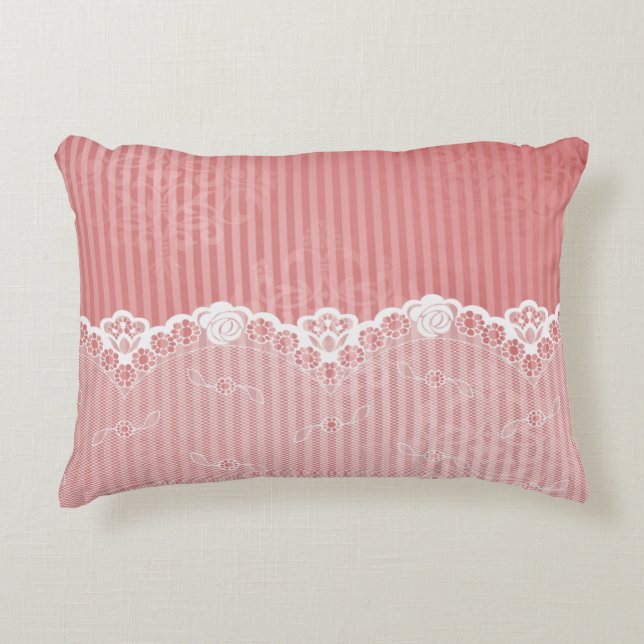 Pink and white background with black lace accent pillow (Front)