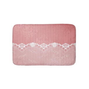 Pink and white background with black lace bathroom mat