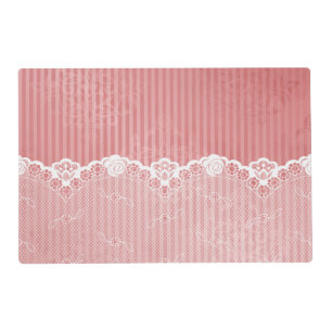 Pink and white background with black lace placemat