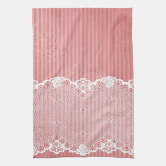 Pink and white background with black lace towel