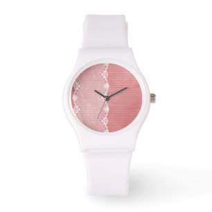 Pink and white background with black lace watch