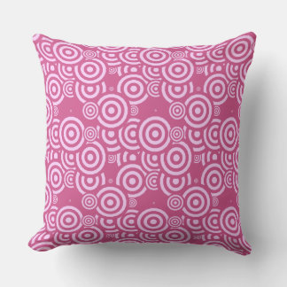 pink and white geometric throw pillow