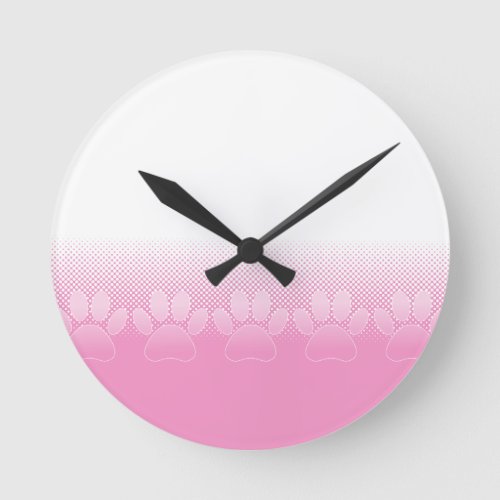 Pink And White Paws With Newsprint Background Round Clock