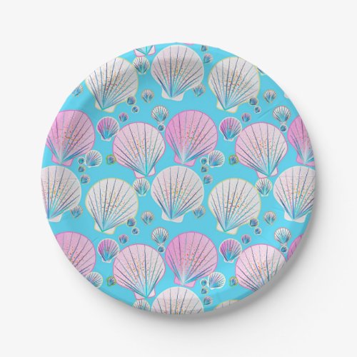 Pink and white sea shells on turquoise paper plates