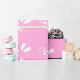 Pink baby footprints wrapping paper with girl name