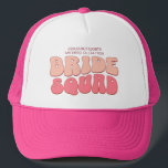 Pink Bachelorette Party Bride Squad Bridesmaid Trucker Hat<br><div class="desc">Make a splash at your upcoming bachelorette party with this stunning retro bachelorette party personalized merchandise. Whether you're celebrating a bach trip, a girls' vacation, or a best friends' holiday, this custom groovy bachelorette party merchandise is the perfect addition to your unforgettable getaway. Add a personal touch to your bachelorette...</div>