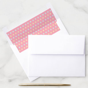 Pink background with blue and yellow polka dots envelope liner