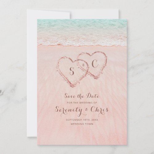 Pink beach hearts in the sand save the date
