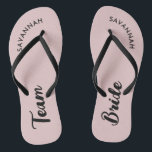 Pink Black Name Bride Bridal Party Bachelorette Flip Flops<br><div class="desc">A simple black and pink minimalist typography design for a bridal shower, bachelorette party or beach wedding. The text is customizable and can be personalized with your own name and bride slogan. For example, Bride Squad instead of Team Bride, Bride repeated on the left and right foot, or something else....</div>