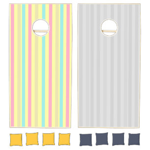 Pink, blue and brown stripes on yellow cornhole set