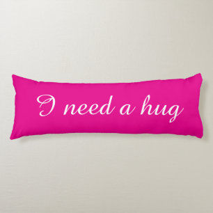 Pink body pillow with custom text   I need a hug