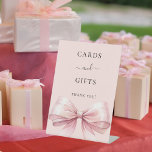 Pink bow cards gifts sign<br><div class="desc">A soft blush pink elegant background,  decorated with a large bow.  Text: Cards and Gifts. Thank you!</div>