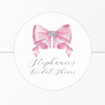 Pink Bow Coquette Glam Bridal Shower Classic Round Sticker<br><div class="desc">These bridal shower stickers feature a chic glam silky bow design with faux rhinestones. Personalize the text with the bride's name.  Matching bridal shower party supplies also available.</div>