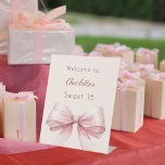 Pink bow cream beige Sweet 16 welcome Pedestal Sign<br><div class="desc">A stylish cream,  beige background decorated with a large pink bow.   Personalize and add a name.</div>