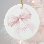 Pink Bow Monogram Christmas Ornament<br><div class="desc">Add a touch of elegance and femininity to your holiday decor with this beautiful Christmas ornament featuring a delicate pink bow and a personalized script initial monogram. The soft, girly design is perfect for bringing a cute and trendy accent to your Christmas tree. Easily customize with your initial for a...</div>