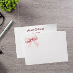 Pink bow return address envelope<br><div class="desc">White background. Personalize and add a name and your return address. The name is written with a modern and trendy handlettered style script. Decorated with a pink bow.</div>
