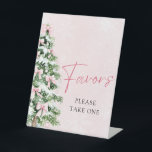 Pink Bows Christmas Tree Winter Baby Shower Favors Pedestal Sign<br><div class="desc">Add a touch of sweetness to your baby shower with this Pink Bows Christmas Tree Favors Sign! 🎀🎄 Featuring an adorable pink bow and a festive Christmas tree, this charming sign is perfect for leading your guests to their special treats. 💕 The soft pink hues and whimsical winter design create...</div>