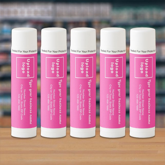 Pink Business Brand on Lip Balm (Lip balm with pink front label and your business brand displayed in a store.)