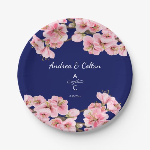 Pink cherry blossoms on navy blue paper plates