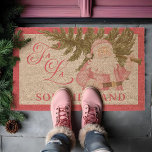 Pink Christmas Vintage Santa Claus Farm Fresh Tree Fiber Doormat<br><div class="desc">Welcome guests to your home with our beautiful festive Holiday Christmas Coir Door Mat, a perfect blend of nostalgic charm and holiday cheer. This doormat features an enchanting watercolor illustration of a vintage pink Santa Claus joyfully carrying a Christmas tree, capturing the warmth and magic of classic holiday traditions. Adding...</div>