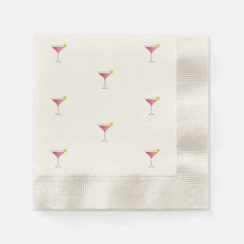 Pink cocktail with a slice of lemon napkins