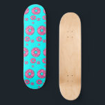 Pink cream donuts skateboard<br><div class="desc">Pink cream donuts on blue background.</div>
