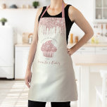 Pink Cupcake Glitter Drips Gold Bakery Pastry Chef Apron<br><div class="desc">Here’s a wonderful way to add to the fun of baking. Add extra sparkle to your culinary adventures whenever you wear this elegant, sophisticated, simple, and modern apron. A sparkly, rose gold cupcake, glitter drips, and dark gray handwritten typography overlay a faux metallic champagne gold ombre background. Personalize with your...</div>