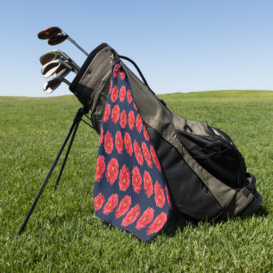 Pink dahlia flower on blue golf towel