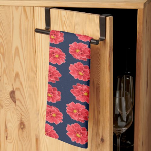 Pink dahlia flower on blue kitchen towel