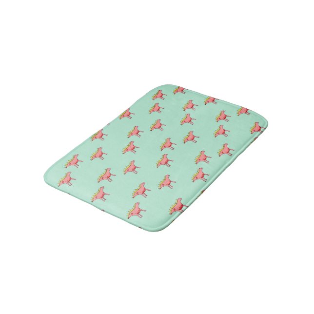 Pink dinosaurs pattern on pale blue bath mat (Angled)