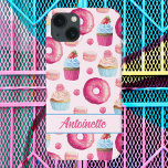 Pink Donut iPhone 13 Case<br><div class="desc">Indulge your sweet tooth lifestyle with our delectable phone case featuring a mouth-watering design of donuts, cupcakes, and macarons. This phone case is not only useful and versatile, but also stylish and eye-catching, making it the perfect item for any occasion. With it's high-quality materials and vibrant colors, it is sure...</div>