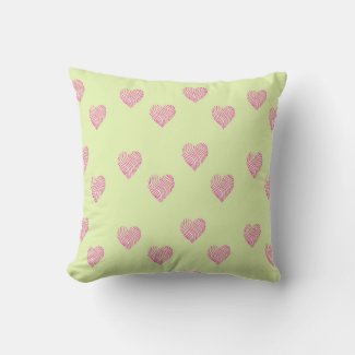 Pink doodle lines hearts on green