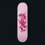Pink Dragon and Blossoms Skateboard<br><div class="desc">a decorative design of a pink colored dragon, lizard or serpent with pink blossoms growing from a tree branch on a lightly pink colored skateboard.</div>