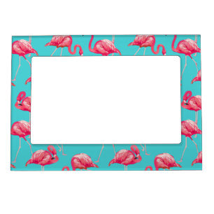 Pink flamingo birds on turquoise background magnetic frame