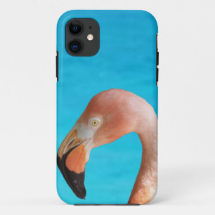Pink flamingo face against blue water on a iPhone 11 case