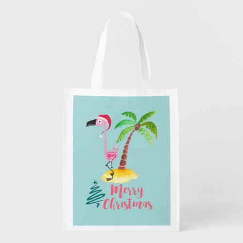 Pink Flamingo In A Santa Hat By A Palm Tree Reusable Grocery Bag